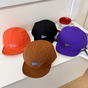 Quick-dry five-panel camp caps in four colors with triangle patch and casual style