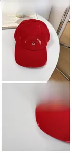 Detail of red distressed cotton baseball cap with moonmoi Garden rose embroidery