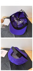 Detail view of purple quick-dry baseball cap showing adjustable strap and inner structure