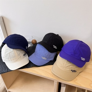 Short brim baseball caps in six colors with NEVER GIVEUP embroidery for sun protection