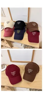 Flat display of cotton baseball caps featuring vintage Grandpa's Outdoor embroidery