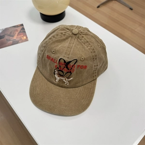 Washed khaki cotton baseball cap with dog embroidery and vintage adjustable fit