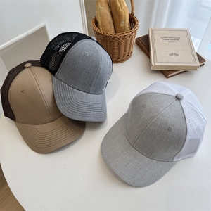 Three stylish breathable mesh trucker hats in various color combinations for outdoor casual use