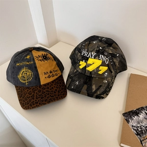 Distressed street style baseball caps with embroidery, camo pattern and leopard brim