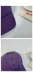 Detailansicht der dunkelvioletten Baumwollkappe mit weißem Logo-Stick G/o