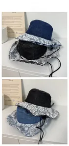 Détails de chapeaux bobs en denim bleu et noir avec dentelle blanche et cordon de serrage