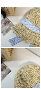 Detail of hand-woven straw texture and blue gingham ribbon on a wide-brim sun hat