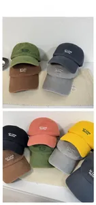 Detailed embroidery of All Lives Revive text on washed cotton baseball caps in various colors