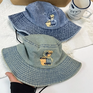 Denim bucket hat with bear embroidery and adjustable windproof cord for sun protection