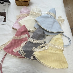 Flat lay of plaid cotton sun hats with lace trim and bow straps in six assorted colors