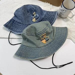 Retro denim bucket hat with bear embroidery and adjustable drawstring in blue and green