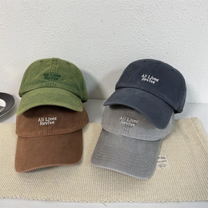Washed cotton baseball caps with All Lives Revive embroidery in multiple vintage colors
