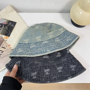 Vintage washed denim bucket hat with bear print in light blue and dark grey