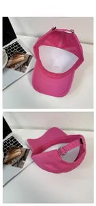 Detailed view of the rose red baseball cap's adjustable metal buckle and inner structure
