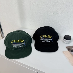 Classic embroidered baseball caps in forest green and black featuring marlin fish design