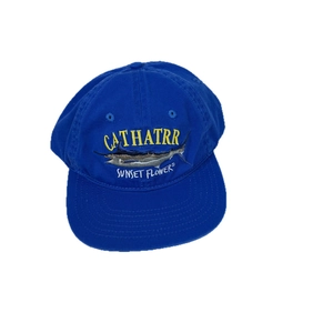 Royal blue washed cotton baseball cap with marlin embroidery and sunset flower text