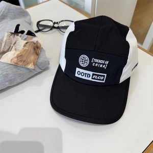 Streetwear two-tone 5-panel baseball cap with white embroidery on a neutral background