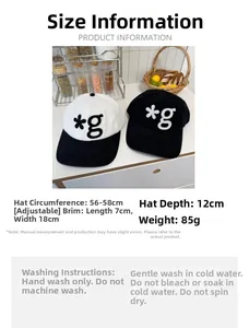 Detail of adjustable cotton baseball cap featuring embroidered letter and contrast brim
