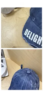 Detailed view of blue-purple washed denim baseball cap with white Delight lettering