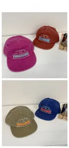 Detailed tile display of washed cotton baseball caps in rose, rust, green, and blue