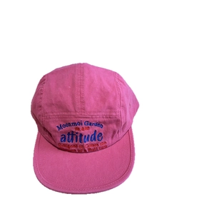 Front view of a pink five-panel flat brim camp cap with Moonmoi Garden embroidery