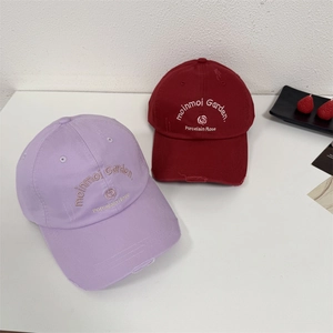 Distressed cotton baseball caps with flower embroidery in lavender and deep red colors