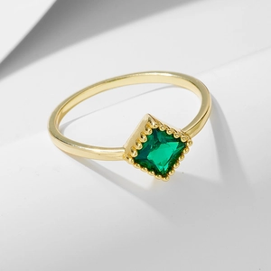 Square emerald zircon ring in gold-tone sterling silver shown from a 45-degree angle