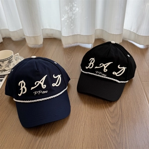 Retro street style baseball cap with BAD embroidery and decorative rope detail