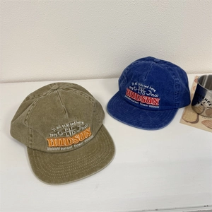 Washed vintage cotton baseball caps in army green and navy blue with Hudson 1975 embroidery