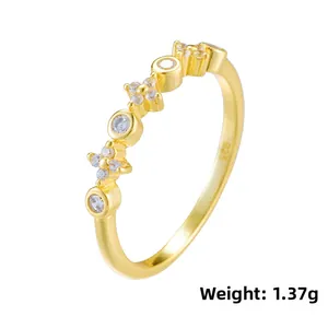Close-up of 925 sterling silver ring with zircon flower design and purity hallmark