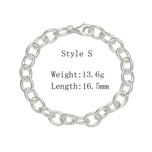Macro shot of silver oval link chain bracelet showing lobster clasp and 13.6g weight