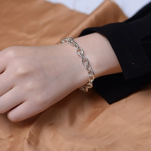 Minimalist S925 sterling silver chunky link chain bracelet shown on a woman wrist