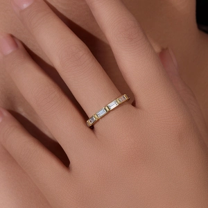 Elegant gold S925 silver ring featuring rectangle cut cubic zirconia in a minimalist style