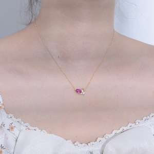 S925 silver necklace with pear-shaped pink ruby pendant and zircons on a gold chain
