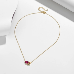 Minimalist S925 silver necklace with pink pear-shaped stone and zircon pendant on white decor