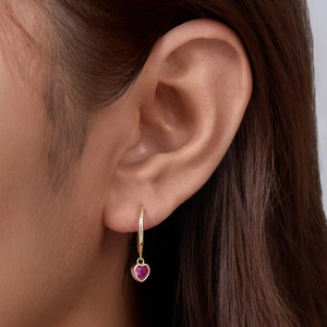 S925 sterling silver heart-shaped zircon earrings with gold hoop on woman model
