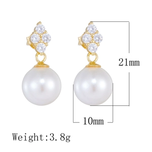 Detailed view of S925 silver four-leaf clover earrings with 10mm round pearls and CZ stones