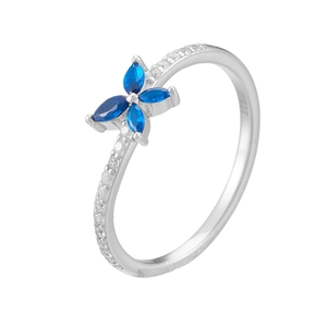 Detail of 925 silver ring featuring blue marquise stones in butterfly shape and white zircons