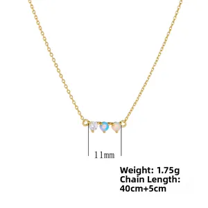 Detail of opal pendant necklace showing 11mm width and 1.75g weight on gold chain
