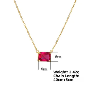Detailed view of rectangular ruby pendant with 8mm by 6mm dimensions and gold chain