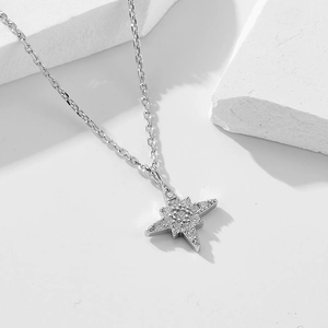 Minimalist sterling silver North Star pendant necklace with sparkling cubic zirconia pavé