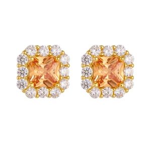 Macro detail of square champagne zircon earrings with sterling silver gold plating