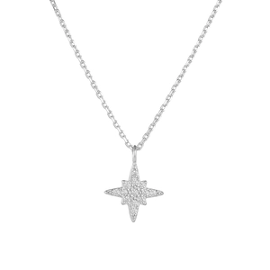 Macro shot of silver eight-pointed star pendant with micro-pave cubic zirconia crystals