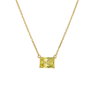 Macro shot of rectangular yellow zircon pendant with a fine gold link chain necklace