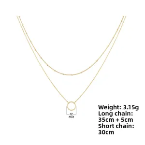 Detail view of gold s925 double layer necklace with dimensions 30cm and 35+5cm length