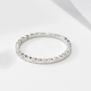 Detailed view of 925 silver ring featuring a beaded design with sparkling cubic zirconia
