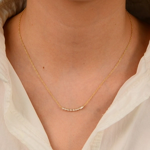 S925 silver smile necklace with rectangular cubic zirconia on a gold chain