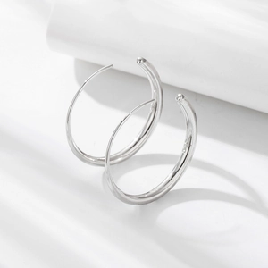 Minimalist S925 sterling silver hoop earrings with a polished geometric circle design