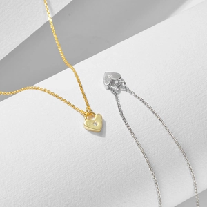 Minimalist sterling silver heart padlock pendant necklace with sparkling cubic zirconia stone
