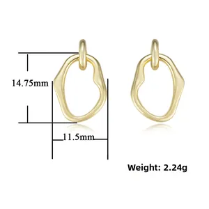 Detailed view of gold irregular geometric earrings with 14.75mm height measurement